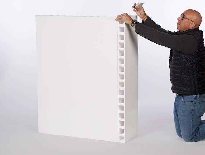 A man showing how the actual size of EverPanel
